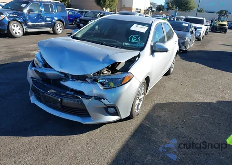 2014 Toyota Corolla Le Plus z USA, uszkodzony, nr VIN 5YFBURHE0EP042733